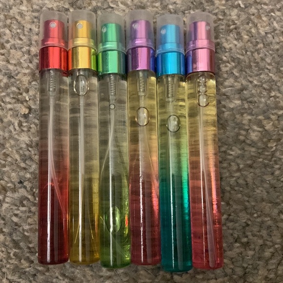 4 FOR $8 !!! Fresh baby powder scented spray on body oil. 💨 - Picture 2 of 4